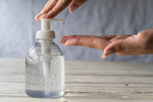 using-hand-sanitizer-gel-with-liquid